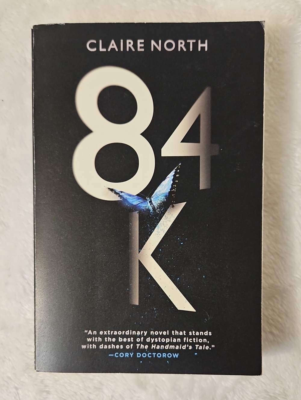84K by Claire North - Paperback Book